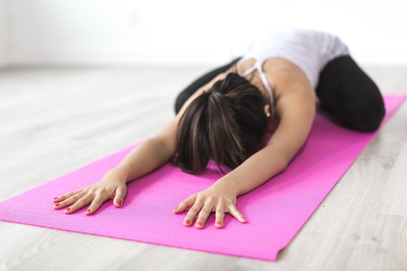 Woman practicing yoga in nature